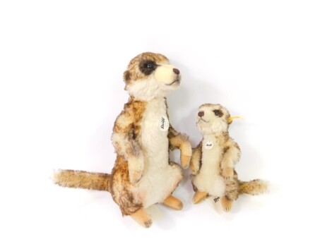 A Steiff Meerkat Cockie, with label to the ear, neck and with further label, 22cm high and another larger 071249. (2)