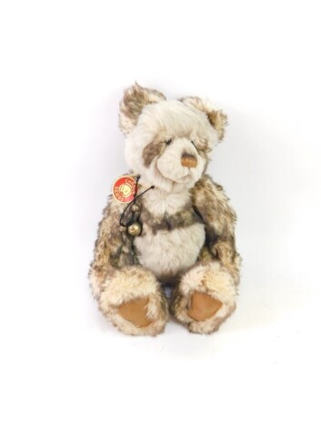 A Charlie Bears Pandy plush jointed teddy bear, CB0104643, in white, black and pink, with label, 41cm high.