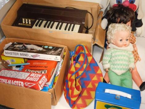 Toys and games, including a Mastermind game, boxed Shell die cast vehicles, celluloid doll of a girl with curly white hair, closed eyes and knitted dress in cream and green, 41cm high, a Quaker Oats child's lunch box, partially boxed electric cord organ, 