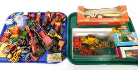 Agricultural and other die cast vehicles, reproduction Lesney Moko, a Farm King metal tractor, Matchbox Ford Tractor Harrow, others to include Dinky toys manure spreader, Massey Harris manure spreader, Volvo BM Valmet, Britains, various other agricultural