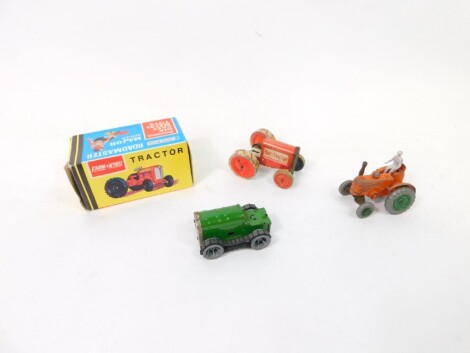 Die cast agricultural vehicles, comprising an Animate Toy baby tractor, clockwork Minic caterpillar, tractor with rider, a Lonestar Roadmaster Farm King boxed tractor. (4)