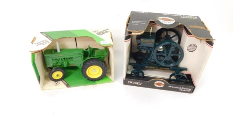 An Ertl John Deere model M tractor, 1:16 scale, boxed, and a McCormick-Deering model M (2).