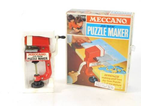 A Meccano jigsaw puzzle maker, boxed.