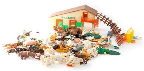 Britains plastic farm animals, further plastic animal figures, with farm house and accessories. (a quantity)