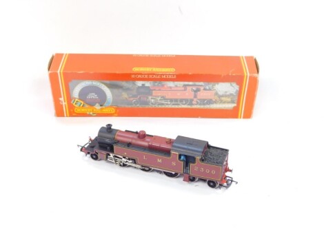 A Hornby OO gauge Class 4P tank locomotive, LMS red livery, 2-6-4, 2300, R0555 boxed.