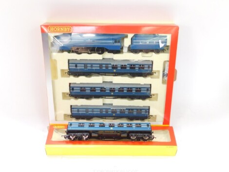 A Hornby Coronation Scot OO gauge set, limited edition 1105/2000, comprising locomotive tender 6220 LMS, three carriages with certificate, boxed, and a further Coronation brake coach, R4127C, boxed. (2)