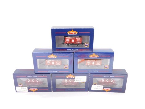 Bachmann OO-gauge rolling stock, including an OCO 14 ton tank wagon with larger filler 37-681, others similar, T Burnett eight plank wagon, etc., boxed. (6)