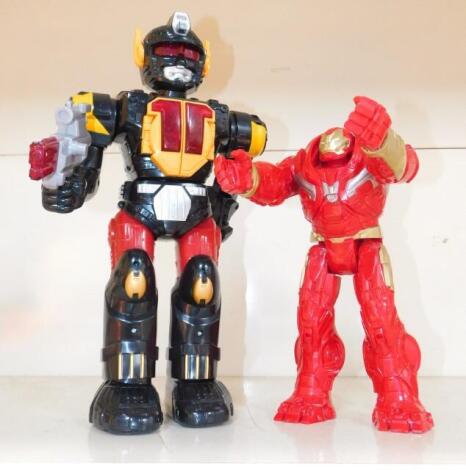 A Chad Valley Chinese battery powered robot, MK92NW, in red and black holding gun, 42cm high, and a further Marvel articulated figure (2).