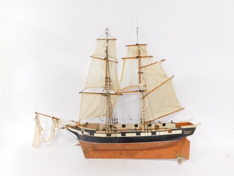 A remote controlled two masted Brigantine The Pelican, unnamed, with wooden hull and fully rigged sails, 102cm wide, 83cm high.