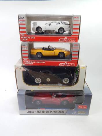 Four die cast sports cars, comprising Sunstar Jaguar XK140 drop head coupe, 1:18 scale., Signature Models 1949 Jaguar XK120 Racing, 1:18 scale., a Majorette Chevrolet Corlette Roadster, 1:24 scale, and a Majorette Porsche 944 Turbo, 1:24 scale, all boxed