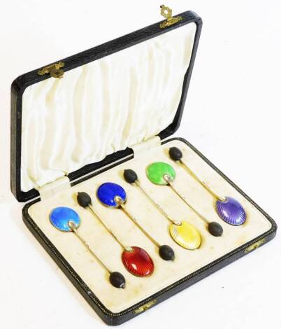 A set of six silver and enamel bean spoons, to include dark blue, light blue, etc. with bean tops, 9cm high, in fitted case. (6)