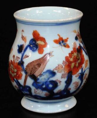 An 18thC Chinese Imari baluster mug with ear handle, predominantly decorated in orange and blue with a bird amongst trees, marked, 12cm high. - 2