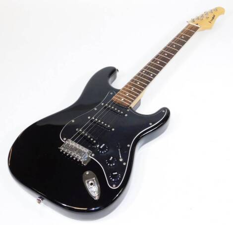 A Westfield Stratocaster type guitar, having black finish with three single coil pickups, rosewood neck.