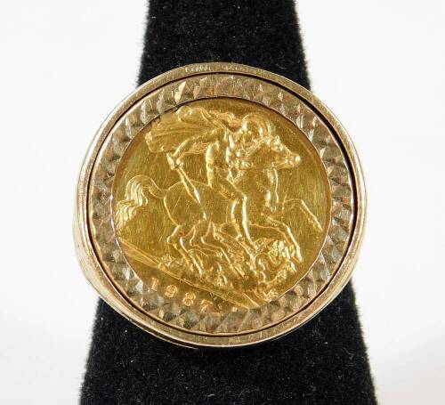 An Elizabeth II gold half sovereign 1987, in basket weave ring setting, size P, 8.5g all in.