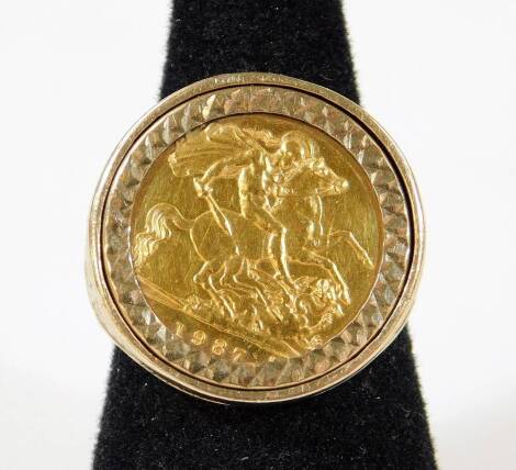 An Elizabeth II gold half sovereign 1987, in basket weave ring setting, size P, 8.5g all in.