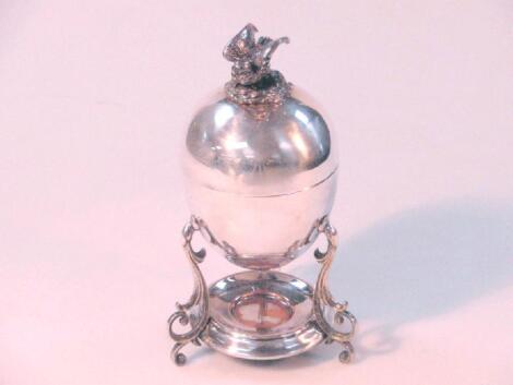 A Victorian silver plated egg warmer