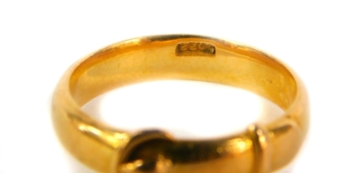 A yellow metal buckle ring, marked 18ct, 4.8g. - 2