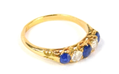 A sapphire and diamond five stone ring, set in unmarked yellow metal, 3.7g all in. - 2