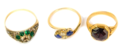 Three gem set dress rings, including sapphire and white stone example, all set in yellow metal. - 2