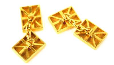 A pair of cufflinks, set with rubies and cast in yellow metal. - 2