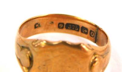 A 9ct gold signet ring, 5.5g and a fine yellow metal chain (2). - 3