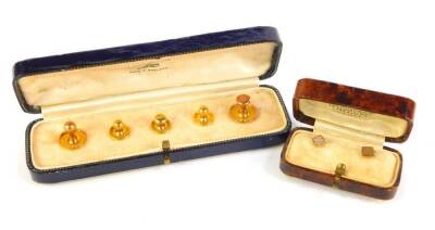 Two cased sets of shirt studs, 9ct gold, but with a single 18ct, 5.8g all in.