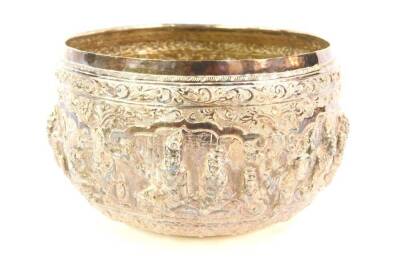 A 19thC Indian bowl, embellished with figures in relief, white metal, unmarked, 15cm diameter, 10½oz.