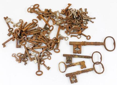 A quantity of 19thC and other keys, 8cm wide. (a large quantity)