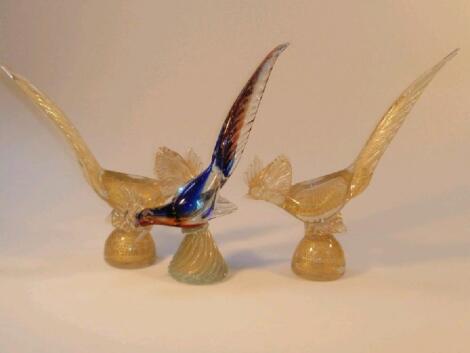 A pair of Murano glass pheasants internally decorated with gold and another