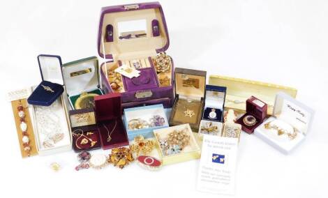 Various costume jewellery and effects, a costume brooch of shaped floral form with plain pin back, 5cm wide, a gold plated gate bracelet, various other costume jewellery, the Fell Cup Final Umpire medallion 1996, various other costume brooches, gold fille