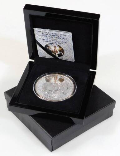 A cased five pound fine silver proof edition Queen Elizabeth II Trisdan Da Cunha coin, 7cm diameter, in outer case and box with paperwork.