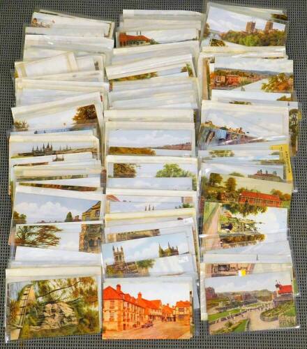 Various postcards, early 20thC and other Quinton type printed watercolour scenes to include Grange-Over-Sands, Pulteney Street Bath, Bournemouth, seascapes, landscapes, Babbacombe Beech, Shepperton Loch, various other printed cards. (a quantity)