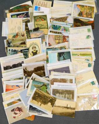 Various postcards, early 20thC printed coloured townscapes to include continental scenes, Brussels, UK scenes, Derry's Clock Plymouth black and white photographic card, a quantity of other seascapes, etc., Torquay, printed soldier cards, figure at a bowli