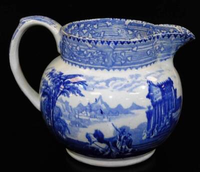 An early 20thC Abbey blue and white pottery jug, of bulbous form with beak spout and plain handle transfer printed with typical scene, 14cm high, an Arcadian blue transfer printed jug and two others. (a quantity) - 7