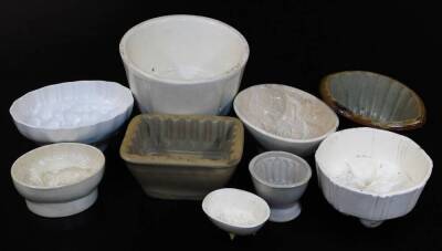 Various pottery jelly moulds, to include Jules Lang & Son printed example 19cm wide, an earlier florally set example, another with wheatsheaf, etc. (5)