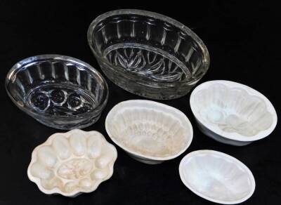 Various pottery and glass jelly moulds, to include one of oval form, 17cm wide, another with floral centre, various others, etc. (6) - 2