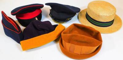 Various hats, a straw boater with green, yellow and blue bow, interior measurement 20cm x 17cm, a peak cap, another marked 54 Weston Cap, 6¾ size, various other hats. (a quantity)