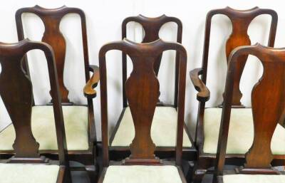 A set of six (4+2) Queen Anne style dining chairs, each with an hour glass splat, drop in seat in later scroll material, on cabriole front legs terminating in pad feet with sabre back legs, the carvers 107cm high. (6) - 2