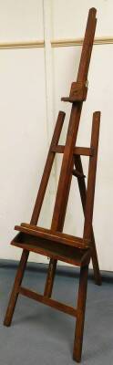 A stained beech easel, with articulated back section, Windsor & Newton style, but unmarked, 202cm high.