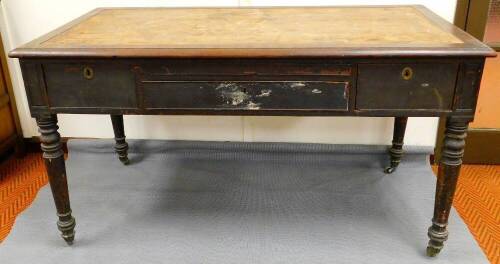 A 19thC mahogany architect's desk, of rectangular form with an arrangement of drawers, on turned legs terminating in castors, with adjustable top 84cm high, 152cm wide, 79cm deep. (AF)