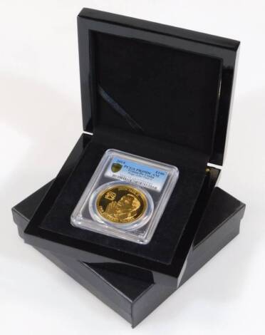 A Pope John Paul II one hundred pound gold coin, in outer case and box.