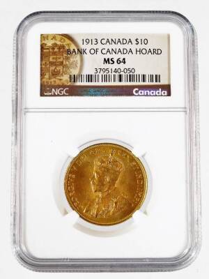 A 1913 Bank of Canada hoard gold ten dollar coin, in plastic casing.