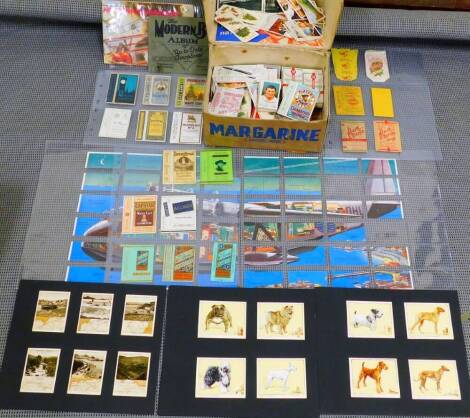 Various cigarette, trade and other cards, vintage pressed cigarette card packs for Navy Cut Blue Boy, etc., part cigarette and trade card sets, card viewer, booklet of History of Aviation, various loose cards to include Gallaher Trains of The World, Radat