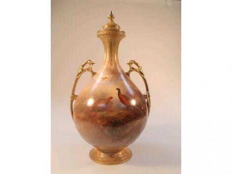 A Crown Devon Fieldings two-handled vase and cover