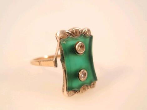 A 1920's jade and diamond set dress ring