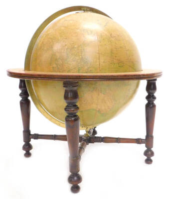 A 19thC mahogany W & T.M Bardin New British Terrestrial globe, printed to the right honourable Sir Joseph Banks Bart KB, with brass calibrated vertical ring and central equator or horizon on a turned wooden stand with x shaped stretcher, sections of repa