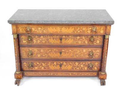 An early 19thC Dutch walnut marquetry commode, with marble top over four drawers with lion mask ring handles each enriched with floral inlay flanked by cylindrical columns, on hairy paw feet, 87cm high, 123cm wide, 54cm deep.