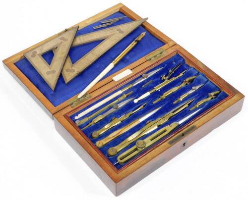 A late Victorian rosewood cased technical drawing or geometry set, containing finely engineered brass and steel implements in a pull out tray, revealing further implements and a plain interior, 83.5cm wide, 14cm deep, 6cm high.