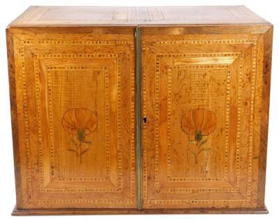 A fine late 16thC South German marquetry table cabinet or kunstkammer, probably Augsburg, with early 19thC alterations, the two doors revealing panels of musical trophies, the central bank of drawers and secret compartments depicting town scenes with bird - 2