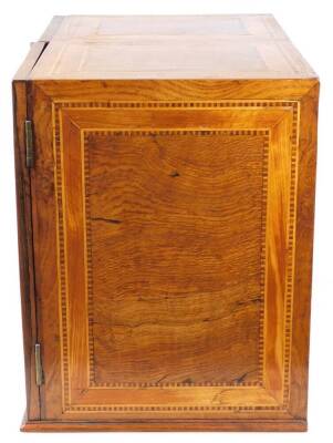 A fine late 16thC South German marquetry table cabinet or kunstkammer, probably Augsburg, with early 19thC alterations, the two doors revealing panels of musical trophies, the central bank of drawers and secret compartments depicting town scenes with bird - 5